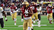 Nov 15, 2025; Chestnut Hill, Massachusetts, USA; Boston College Eagles running back Turbo Richard (2) runs the ball during the first half against Georgia Tech Yellow Jackets at Alumni Stadium. Mandatory Credit: Bob DeChiara-Imagn Images