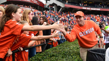 Clemson Head Coach Dabo Swinney greets fans after a 38-3 win over USC at Williams-Brice Stadium in Columbia, South Carolina Saturday, November 30, 2019.