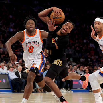 Cleveland Cavaliers guard Darius Garland reacts after being fouled by New York Knicks guard Josh Hart.