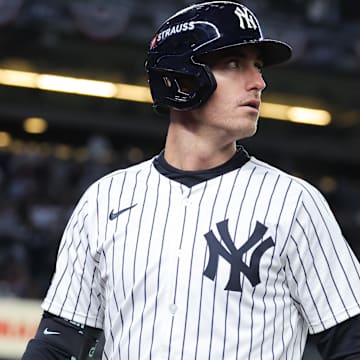 Oct 1, 2025; Bronx, New York, USA; New York Yankees left fielder Cody Bellinger (35) reacts after flying out during the third inning against the Boston Red Sox during game two of the Wildcard round for the 2025 MLB playoffs at Yankee Stadium. Mandatory Credit: Brad Penner-Imagn Images