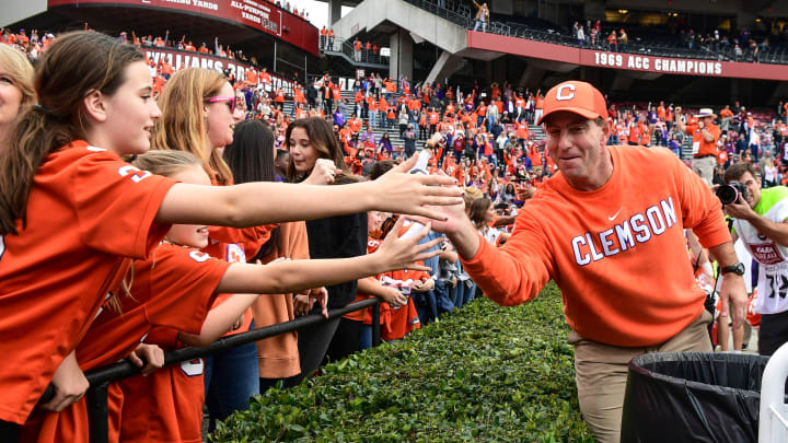 Clemson Head Coach Dabo Swinney greets fans after a 38-3 win over USC at Williams-Brice Stadium in Columbia, South Carolina Saturday, November 30, 2019.