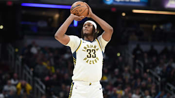 Mar 22, 2025; Indianapolis, Indiana, USA; Indiana Pacers center Myles Turner (33) shoots during the first half against the Brooklyn Nets at Gainbridge Fieldhouse. Mandatory Credit: Robert Goddin-Imagn Images