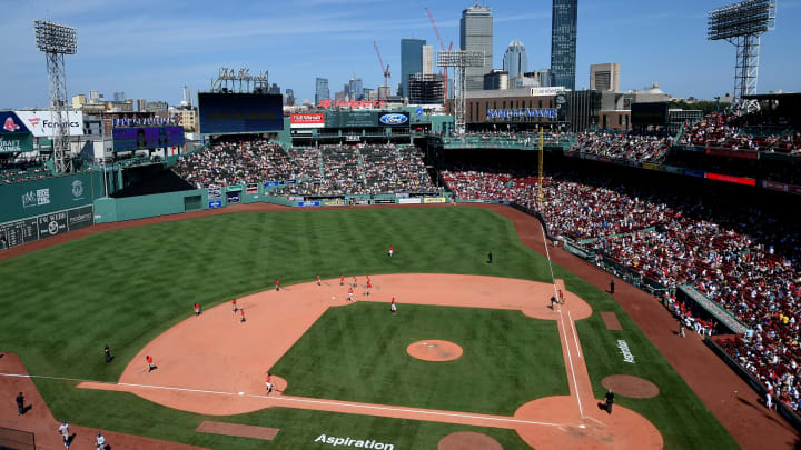 Jul 24, 2022; Boston, Massachusetts, USA;  The Boston Red Sox ground crew prepares the field during