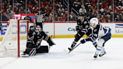 Feb 1, 2025; Washington, District of Columbia, USA; Winnipeg Jets defenseman Josh Morrissey (44) scores the game winning goal in overtime on Washington Capitals goaltender Logan Thompson (48) as Capitals center Connor McMichael (24) defends at Capital One Arena. Mandatory Credit: Geoff Burke-Imagn Images