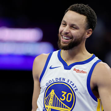 Nov 28, 2023; Sacramento, California, USA; Golden State Warriors guard Stephen Curry (30) laughs during the second quarter against the Sacramento Kings at Golden 1 Center. Mandatory Credit: Sergio Estrada-Imagn Images