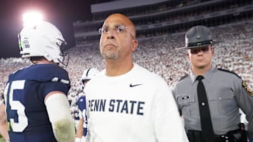 Sep 27, 2025; University Park, Pennsylvania, USA; Penn State Nittany Lions head coach James Franklin and quarterback Drew Allar (15) react after losing to the Oregon Ducks at Beaver Stadium. Mandatory Credit: James Lang-Imagn Images