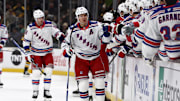 Nov 28, 2025; Boston, Massachusetts, USA; New York Rangers left wing Artemi Panarin (10) is congratulated at the bench after scoring against the Boston Bruins during the first period at TD Garden. Mandatory Credit: Winslow Townson-Imagn Images