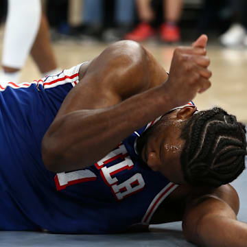 Apr 6, 2024; Memphis, Tennessee, USA; Philadelphia 76ers center Joel Embiid (21) reacts after a turnover during the first half against the Memphis Grizzlies at FedExForum. Mandatory Credit: Petre Thomas-Imagn Images