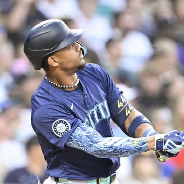 Seattle Mariners center fielder Julio Rodriguez (44) hits a solo home run during the fifth inning against the San Diego Padres at Petco Park on July 9.