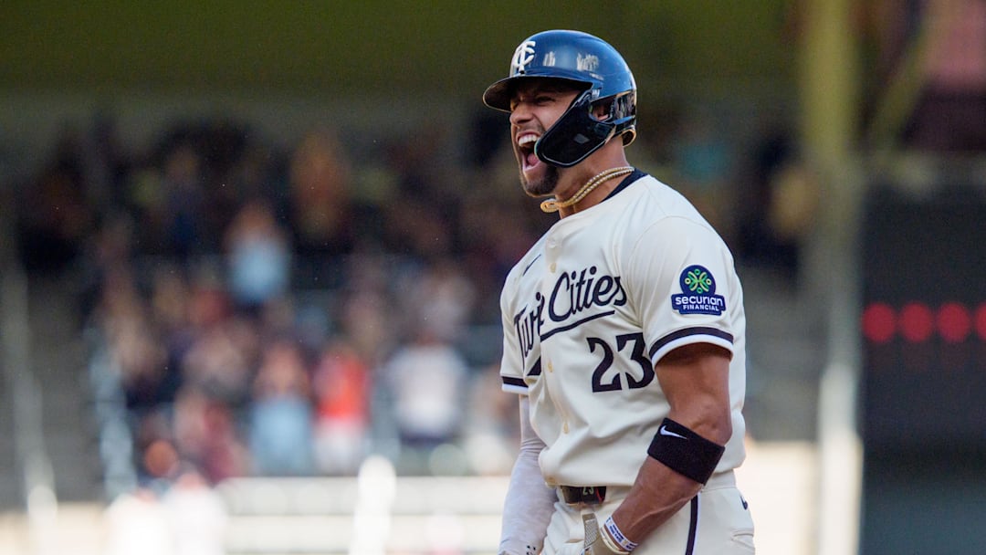 Sep 21, 2025; Minneapolis, Minnesota, USA; Minnesota Twins third base Royce Lewis (23) celebrates a three run home run hit off Cleveland Guardians pitcher Hunter Gaddis (33) in the seventh inning at Target Field. Mandatory Credit: Matt Blewett-Imagn Images