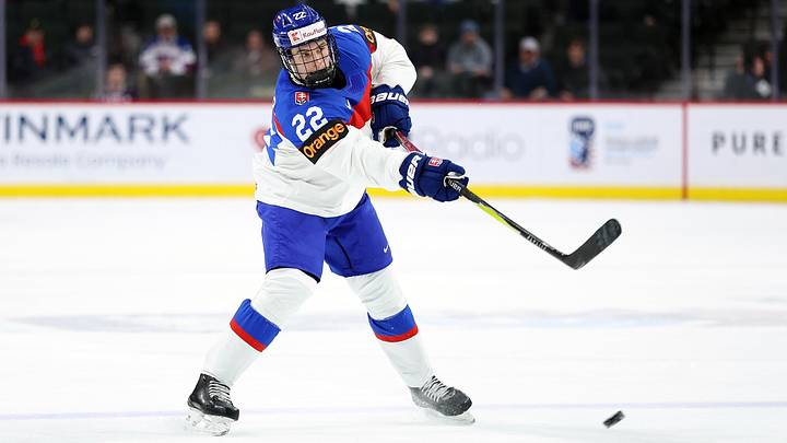 ST PAUL, MINNESOTA - DECEMBER 31: Adam Goljer #22 of Slovakia shoots the puck against Switzerland in the third period of a Group A stage game during the IIHF World Junior Hockey Championship at Grand Casino Arena on December 31, 2025 in St Paul, Minnesota. Switzerland defeated Slovakia 3-2. (Photo by David Berding/Getty Images)