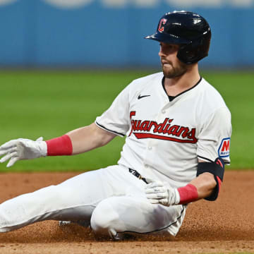 Aug 1, 2024; Cleveland, Ohio, USA; Cleveland Guardians center fielder Lane Thomas (8) slides into second with a double during the seventh inning against the Baltimore Orioles at Progressive Field. Mandatory Credit: Ken Blaze-USA TODAY Sports