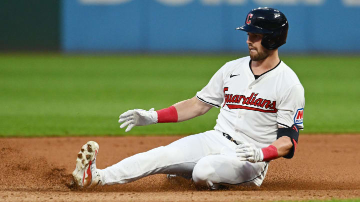 Aug 1, 2024; Cleveland, Ohio, USA; Cleveland Guardians center fielder Lane Thomas (8) slides into second with a double during the seventh inning against the Baltimore Orioles at Progressive Field. 