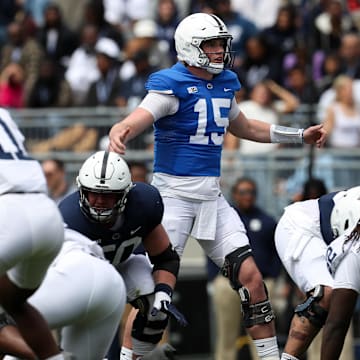 Penn State Nittany Lions quarterback Drew Allar (15) gestures at the line of scrimmage during the second quarter of the Blue-White Game at Beaver Stadium.