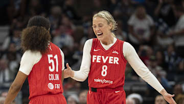 Jul 1, 2025; Minneapolis, Minnesota, USA; Indiana Fever guard Sophie Cunningham (8) celebrates with Indiana Fever guard Sydney Colson (51) after defeating the Minnesota Lynx during the Commissioner's Cup final at Target Center. Mandatory Credit: Jesse Johnson-Imagn Images