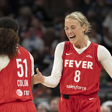 Jul 1, 2025; Minneapolis, Minnesota, USA; Indiana Fever guard Sophie Cunningham (8) celebrates with Indiana Fever guard Sydney Colson (51) after defeating the Minnesota Lynx during the Commissioner's Cup final at Target Center. Mandatory Credit: Jesse Johnson-Imagn Images