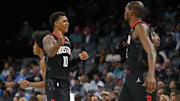 Nov 5, 2025; Memphis, Tennessee, USA; Houston Rockets forward Jabari Smith Jr. (10) reacts with forward Kevin Durant (7)  during the first quarter against the Memphis Grizzlies at FedExForum. Mandatory Credit: Petre Thomas-Imagn Images