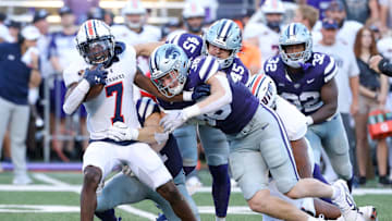 Aug 31, 2024; Manhattan, Kansas, USA; Kansas State Wildcats defensive end Brendan Mott (38) and linebacker Austin Moore (41) tackle Tennessee-Martin Skyhawks running back Narkel LeFlore (7) during the second quarter at Bill Snyder Family Football Stadium. Mandatory Credit: Scott Sewell-Imagn Images