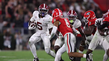 Sep 27, 2025; Athens, Georgia, USA; Alabama Crimson Tide wide receiver Germie Bernard (5) runs against Georgia Bulldogs defensive back Daylen Everette (6) in the second half at Sanford Stadium. Mandatory Credit: Brett Davis-Imagn Images