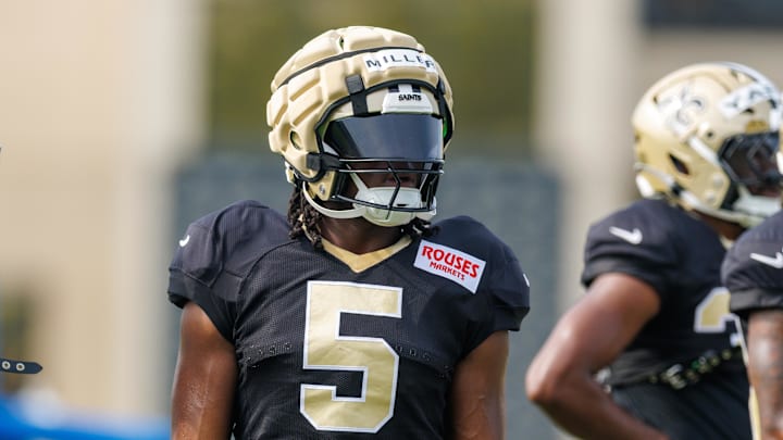 Jul 30, 2025; New Orleans, LA, USA;   New Orleans Saints running back Kendre Miller (5) looks on during training camp at Ochsner Sports Performance Center. Mandatory Credit: Stephen Lew-Imagn Images