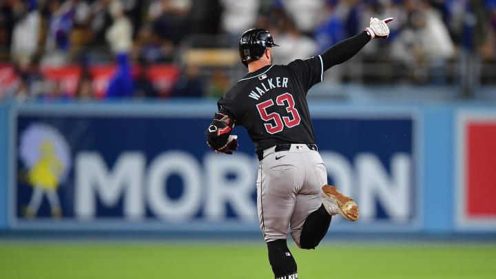 May 22, 2024; Los Angeles, California, USA; Arizona Diamondbacks first baseman Christian Walker (53) runs the bases after hitting a solo home run against the Los Angeles Dodgers during the sixth inning at Dodger Stadium. Mandatory Credit: Gary A. Vasquez-USA TODAY Sports