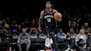 Nov 11, 2025; Brooklyn, New York, USA; Brooklyn Nets guard Terance Mann (14) brings the ball up court against the Toronto Raptors during the fourth quarter at Barclays Center. Mandatory Credit: Brad Penner-Imagn Images