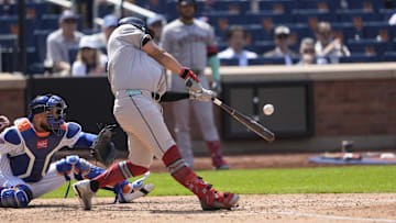 May 1, 2025; New York City, New York, USA; Arizona Diamondbacks first baseman Josh Naylor (22) hits a double against the New York Mets during the fifth inning at Citi Field. Mandatory Credit: Gregory Fisher-Imagn Images