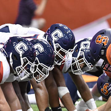Sep 22, 2018; Syracuse, NY, USA; The Connecticut Huskies and Syracuse Orange line up against each other for an extra point during the fourth quarter at the Carrier Dome. Mandatory Credit: Mark Konezny-Imagn Images