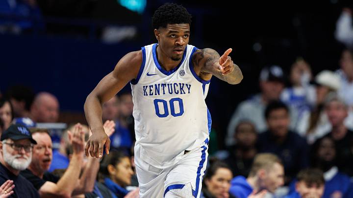 Nov 21, 2025; Lexington, Kentucky, USA; Kentucky Wildcats guard Otega Oweh (00) reacts after making a three point basket during the first half against the Loyola (MD) Greyhounds at Rupp Arena at Central Bank Center. Mandatory Credit: Jordan Prather-Imagn Images