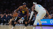 Golden State Warriors forward Jimmy Butler III (10) dribbles the basketball as Miami Heat center Bam Adebayo (13) defends during the first quarter at Kaseya Center.