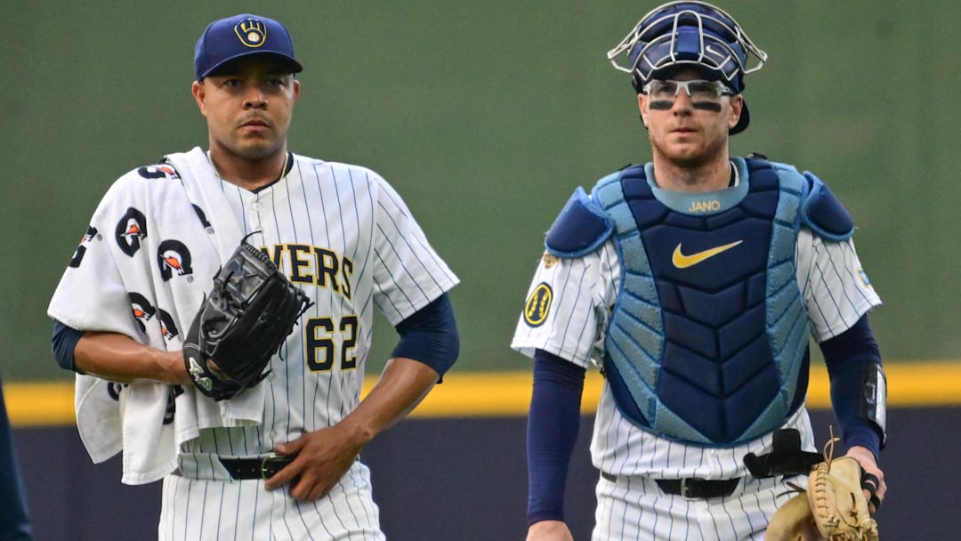 Sep 14, 2025; Milwaukee, Wisconsin, USA; Milwaukee Brewers starting pitcher Jose Quintana (62) gets ready to pitch with catcher Danny Jansen (33) against the St. Louis Cardinals at American Family Field. Mandatory Credit: Benny Sieu-Imagn Images