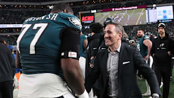 Jan 26, 2025; Philadelphia, PA, USA; Philadelphia Eagles general manager Howie Roseman celebrates with Philadelphia Eagles offensive tackle Mekhi Becton (77) during the fourth quarter of the NFC Championship game against the Washington Commanders at Lincoln Financial Field. Mandatory Credit: Bill Streicher-Imagn Images