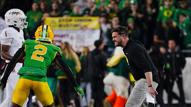 Oregon coach Dan Lanning calls instructions to his team during the game against Maryland at Autzen Stadium