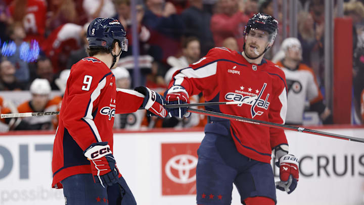 Mar 31, 2026; Washington, District of Columbia, USA; Washington Capitals right wing Ryan Leonard (9) celebrates with Capitals center Pierre-Luc Dubois (80)after scoring a goal against the Philadelphia Flyers during the second period at Capital One Arena. Mandatory Credit: Geoff Burke-Imagn Images