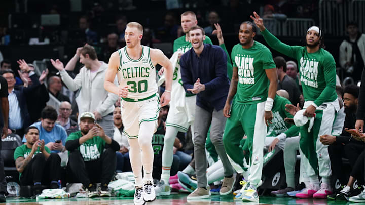 The Boston Celtics bench reacts after forward Sam Hauser (30) makes a three point basket against the Los Angeles Lakers in the first quarter at TD Garden. The Boston Celtics bench reacts after forward Sam Hauser (30) makes a three point basket against the Los Angeles Lakers in the first quarter at TD Garden.