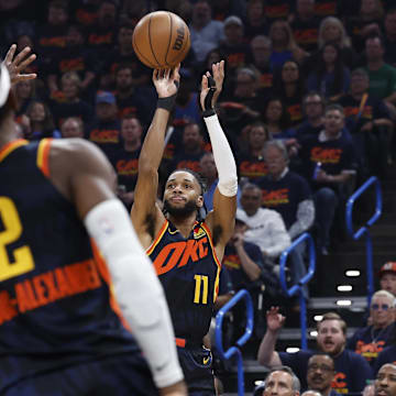 May 15, 2024; Oklahoma City, Oklahoma, USA; Oklahoma City Thunder guard Isaiah Joe (11) shoots a three-point basket against the Dallas Mavericks during the first quarter of game five of the second round for the 2024 NBA playoffs at Paycom Center. Mandatory Credit: Alonzo Adams-Imagn Images