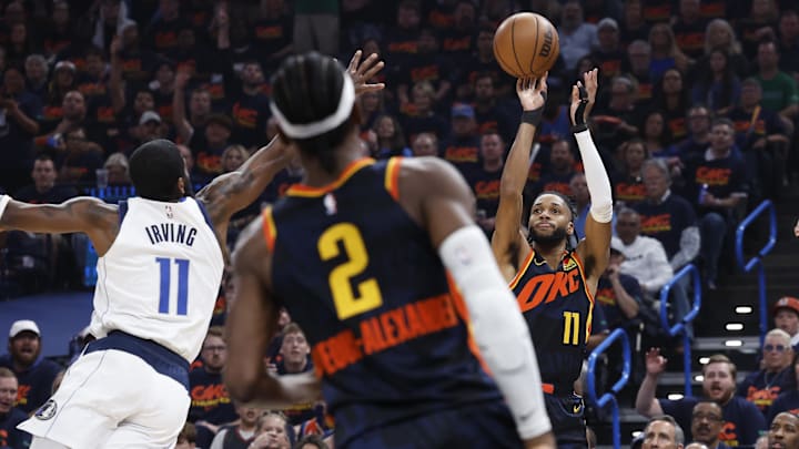 May 15, 2024; Oklahoma City, Oklahoma, USA; Oklahoma City Thunder guard Isaiah Joe (11) shoots a three-point basket against the Dallas Mavericks during the first quarter of game five of the second round for the 2024 NBA playoffs at Paycom Center. Mandatory Credit: Alonzo Adams-Imagn Images