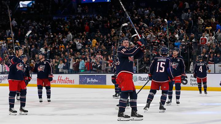 Dec 27, 2024; Columbus, Ohio, USA; The Columbus Blue Jackets acknowledge then crowd after the game against the Boston Bruins at Nationwide Arena. Mandatory Credit: Russell LaBounty-Imagn Images
