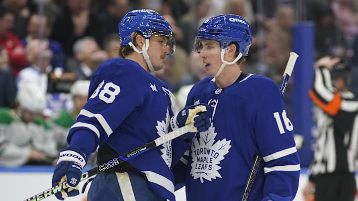 Jan 14, 2025; Toronto, Ontario, CAN; Toronto Maple Leafs forward William Nylander (88) and forward Mitch Marner (16) talk during a break in the action against the Dallas Stars during the third period at Scotiabank Arena. Mandatory Credit: John E. Sokolowski-Imagn Images