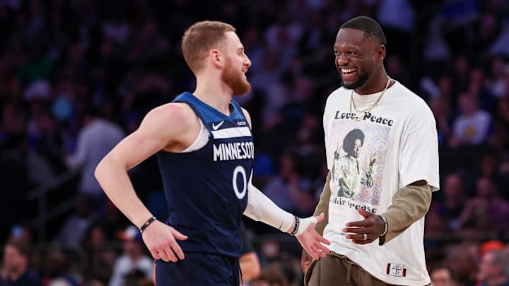 Minnesota Timberwolves guard Donte DiVincenzo celebrates with Julius Randle in a game against the New York Knicks. Minnesota Timberwolves guard Donte DiVincenzo celebrates with Julius Randle in a game against the New York Knicks.