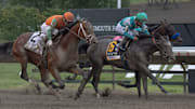 Journalism makes his charge at the finish line to win. Haskell Day at Monmouth Park Race Track in Oceanport NJ on July 19, 2025.