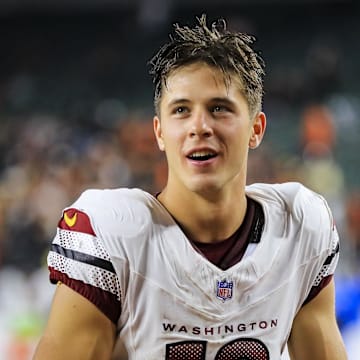 Sep 23, 2024; Cincinnati, Ohio, USA; Washington Commanders wide receiver Luke McCaffrey (12) acknowledges fans after the victory over the Cincinnati Bengals at Paycor Stadium. Mandatory Credit: Katie Stratman-Imagn Images