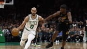 May 7, 2024; Boston, Massachusetts, USA; Boston Celtics guard Derrick White (9) drives on Cleveland Cavaliers guard Caris LeVert (3) during the third quarter of game one of the second round of the 2024 NBA playoffs at TD Garden. Mandatory Credit: Winslow Townson-USA TODAY Sports