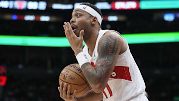 Feb 4, 2025; Toronto, Ontario, CAN; Toronto Raptors guard Bruce Brown (11) reacts to being called for a foul against the New York Knicks during the second half at Scotiabank Arena. Mandatory Credit: John E. Sokolowski-Imagn Images