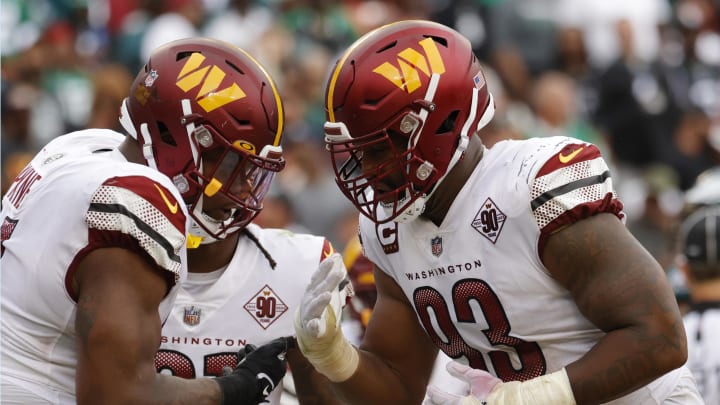 Sep 25, 2022; Landover, Maryland, USA; Washington Commanders defensive tackle Daron Payne (94) celebrates with Commanders defensive tackle Jonathan Allen (93) after a safety against the Philadelphia Eagles at FedExField. Mandatory Credit: Geoff Burke-USA TODAY Sports