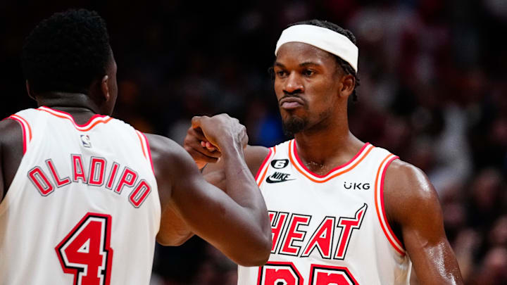 Jan 10, 2023; Miami, Florida, USA; Miami Heat forward Jimmy Butler (22) celebrates with guard Victor Oladipo (4) after scoring against the Oklahoma City Thunder during the fourth quarter at FTX Arena. Mandatory Credit: Rich Storry-Imagn Images