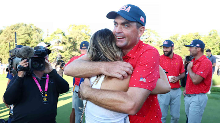 MONTREAL, QUEBEC - SEPTEMBER 29: Keegan Bradley of the U.S. Team celebrates with Jillian Bradley after defeating the International Team during Sunday Singles on day four of the 2024 Presidents Cup at The Royal Montreal Golf Club on September 29, 2024 in Montreal, Quebec, Canada. (Photo by Vaughn Ridley/Getty Images)