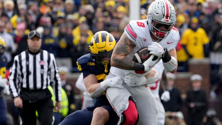 Nov. 25, 2023; Ann Arbor, Mi., USA;
Ohio State Buckeyes tight end Cade Stover (8) is tackled by University of Michigan linebacker Jimmy Rolder (30) during the first half of SaturdayÕs NCAA Division I football game at Michigan Stadium.