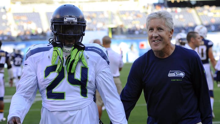 Aug. 8, 2013; San Diego, CA; Seattle Seahawks running back Marshawn Lynch (24) and head coach Pete Carroll prior to the game against the San Diego Chargers at Qualcomm Stadium.