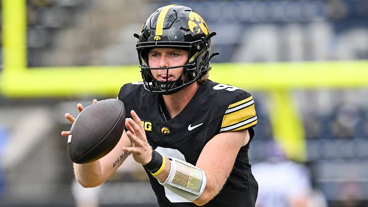 Sep 19, 2026; Iowa City, Iowa, USA;  Iowa Hawkeyes quarterback Hank Brown (9) warms up before the game against the UNI Panthers at Kinnick Stadium.  Mandatory Credit: Jeffrey Becker-Imagn Images